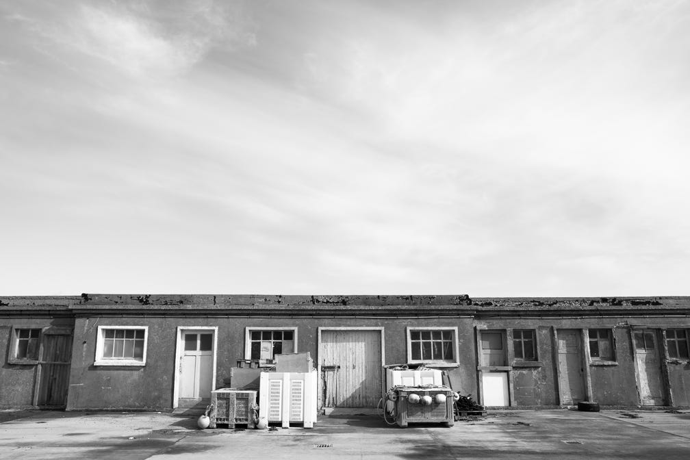 paysage, oretail photography,  olivier retail, black and white, bretagne, brittany, bw, hanger, harbour, ile de sein, monochrom, monochrome, noir et blanc, port, warehouse, landscape